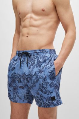 Logo-badge swim shorts with seasonal print