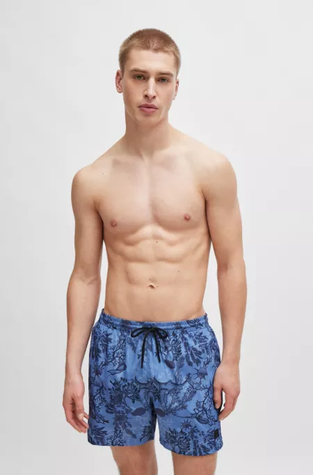 Logo-badge swim shorts with seasonal print