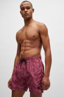 Ba&ntilde;ador con insignia de logo y estampado de temporada, Rojo claro