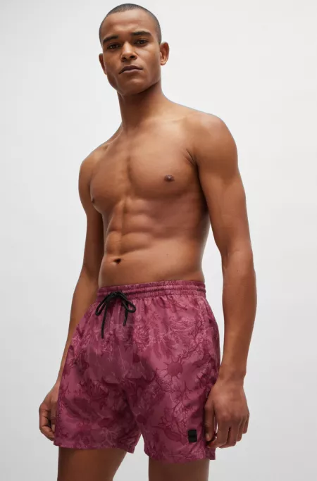 Logo-badge swim shorts with seasonal print