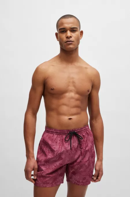 Logo-badge swim shorts with seasonal print