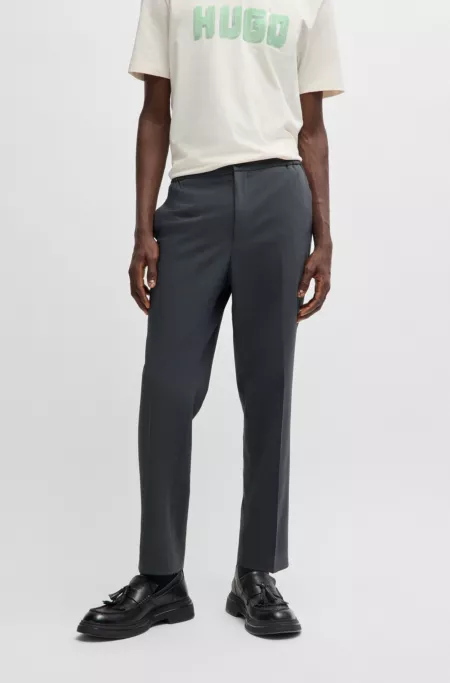 Slim-fit trousers in patterned stretch twill