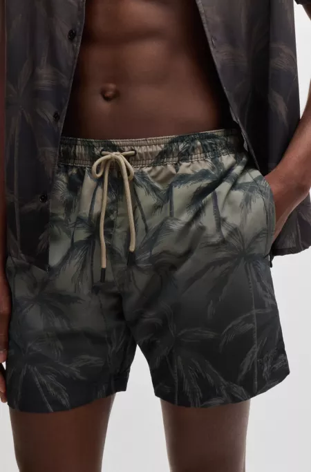Quick-dry swim shorts with seasonal print