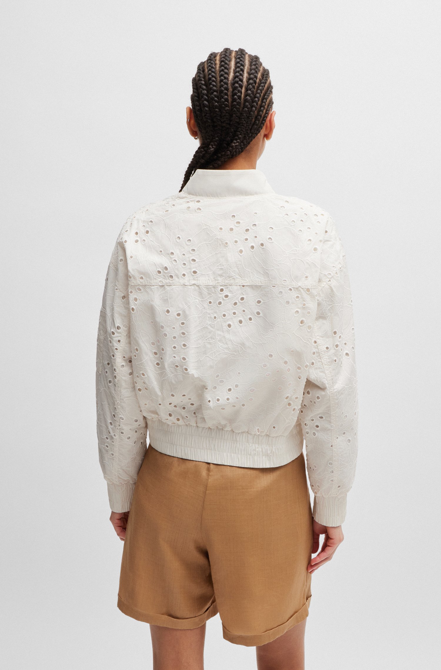 Embroidered bomber jacket with zipped sleeve pocket