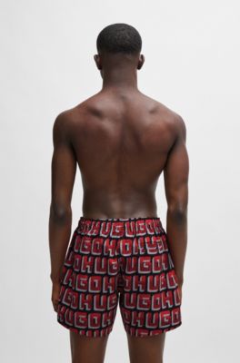 Ba&ntilde;ador tipo shorts de secado r&aacute;pido con logo estampado por toda la prenda, Negro