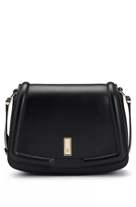 Signature-hardware saddle bag in leather