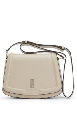 Shop Hugo Boss Leather Saddle Bag With Signature Hardware And Monogram In Light Beige