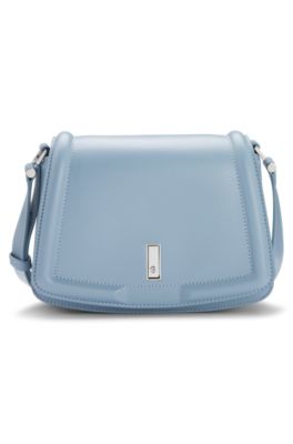 Signature-hardware saddle bag in leather, Light Blue