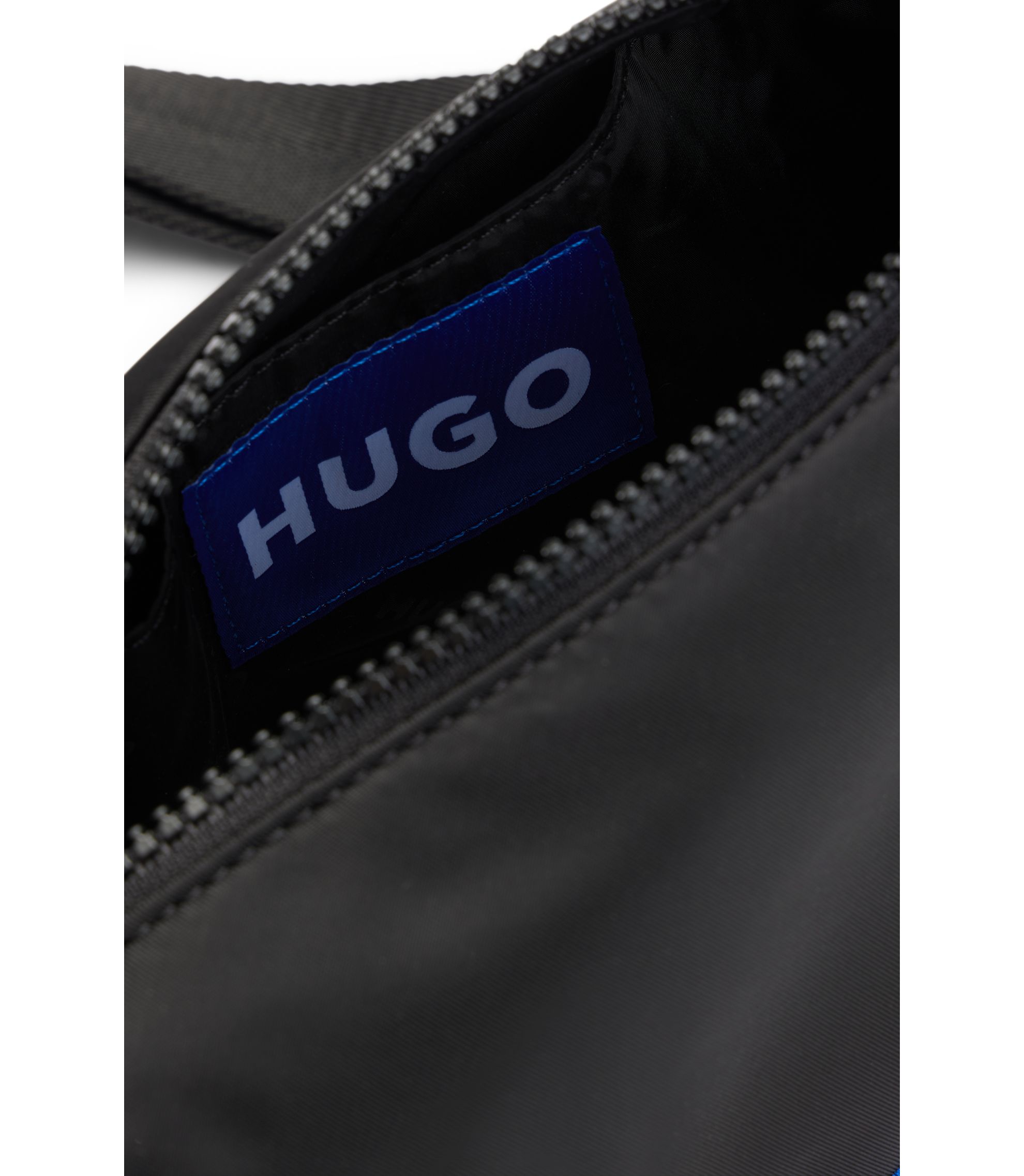 HUGO - Crossbody bag in structured twill with blue logo trim
