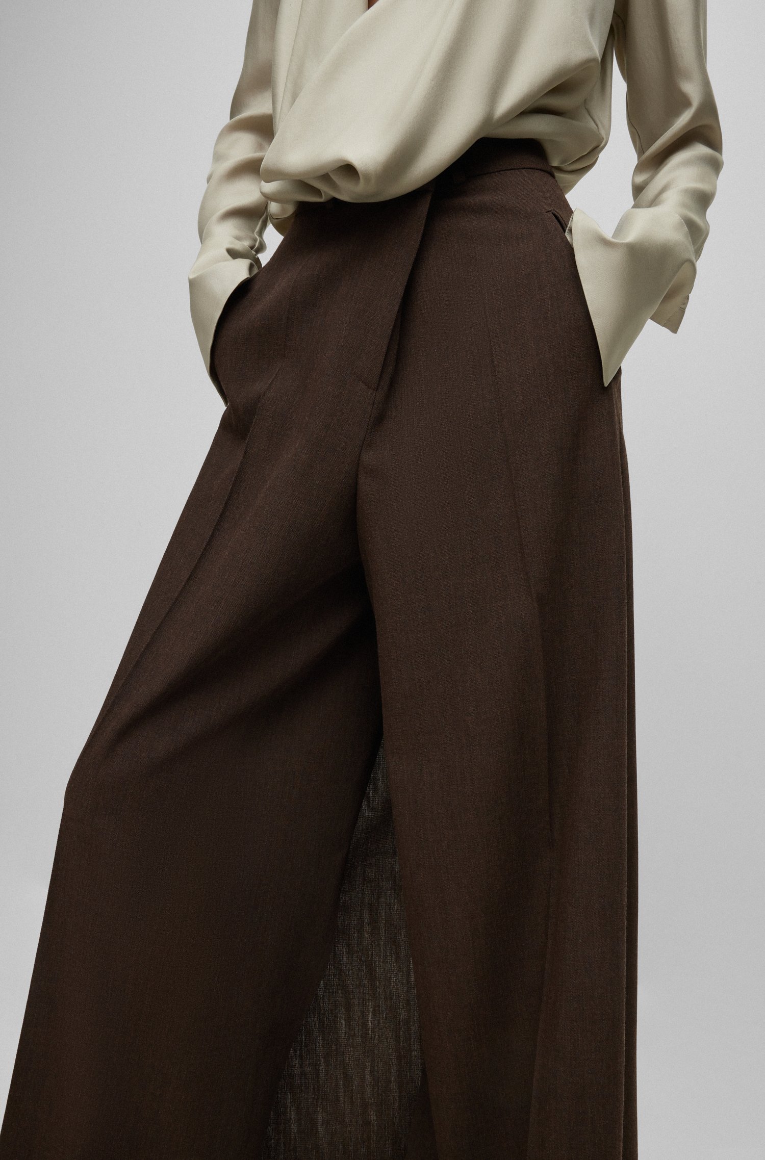 Pantalones de lana relaxed fit con pernera ancha y efecto falda