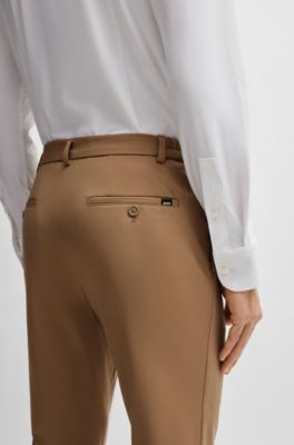 Pantalones slim fit de punto t&eacute;cnico el&aacute;stico, Beige claro