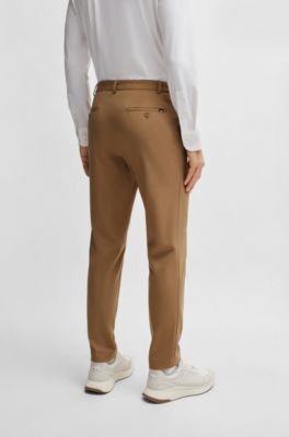 Pantalones slim fit de punto t&eacute;cnico el&aacute;stico, Beige claro