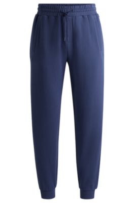 Cotton-terry tracksuit bottoms with flocked logo, Dark Blue