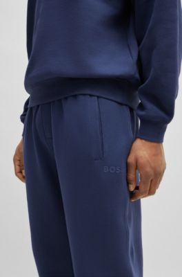 Cotton-terry tracksuit bottoms with flocked logo, Dark Blue