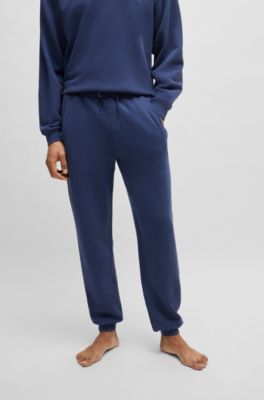 Cotton-terry tracksuit bottoms with flocked logo, Dark Blue
