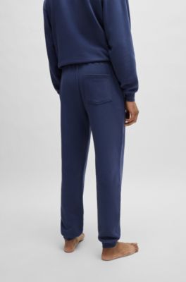 Cotton-terry tracksuit bottoms with flocked logo, Dark Blue