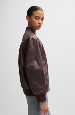 Leather bomber jacket with embossed crocodile motif, Light Red