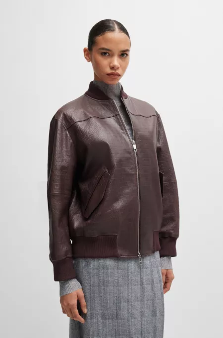 Leather bomber jacket with embossed crocodile motif
