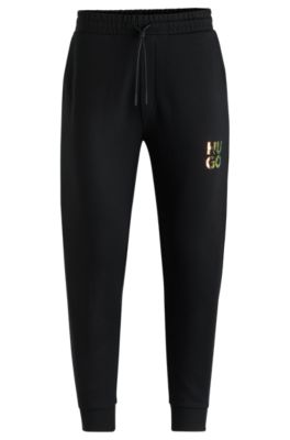 Hugo Boss Cotton-terry Tracksuit Bottoms With Stacked Logo In Black