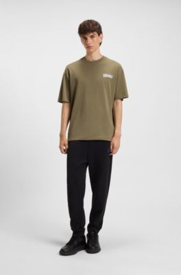 Cotton-terry tracksuit bottoms with Happy HUGO, Black