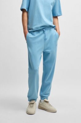 Cotton-terry tracksuit bottoms with Happy HUGO, Light Blue
