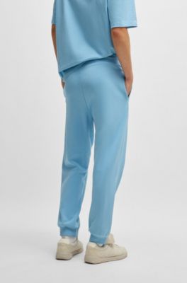 Cotton-terry tracksuit bottoms with Happy HUGO, Light Blue