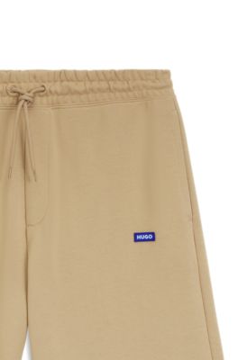 Cotton-terry shorts with logo patch, Beige