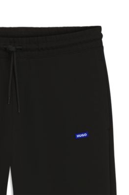 Cotton-terry sweatpants with logo patch, Black