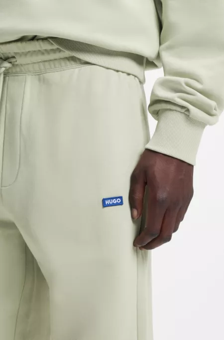Cotton-terry sweatpants with logo patch
