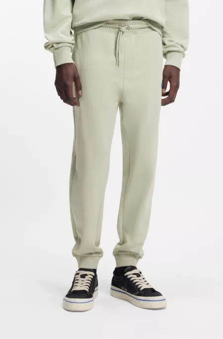 Cotton-terry sweatpants with logo patch
