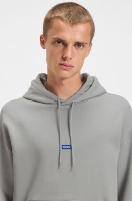 Prenda con capucha de felpa de algod&oacute;n con parche de logo azul, Gris claro