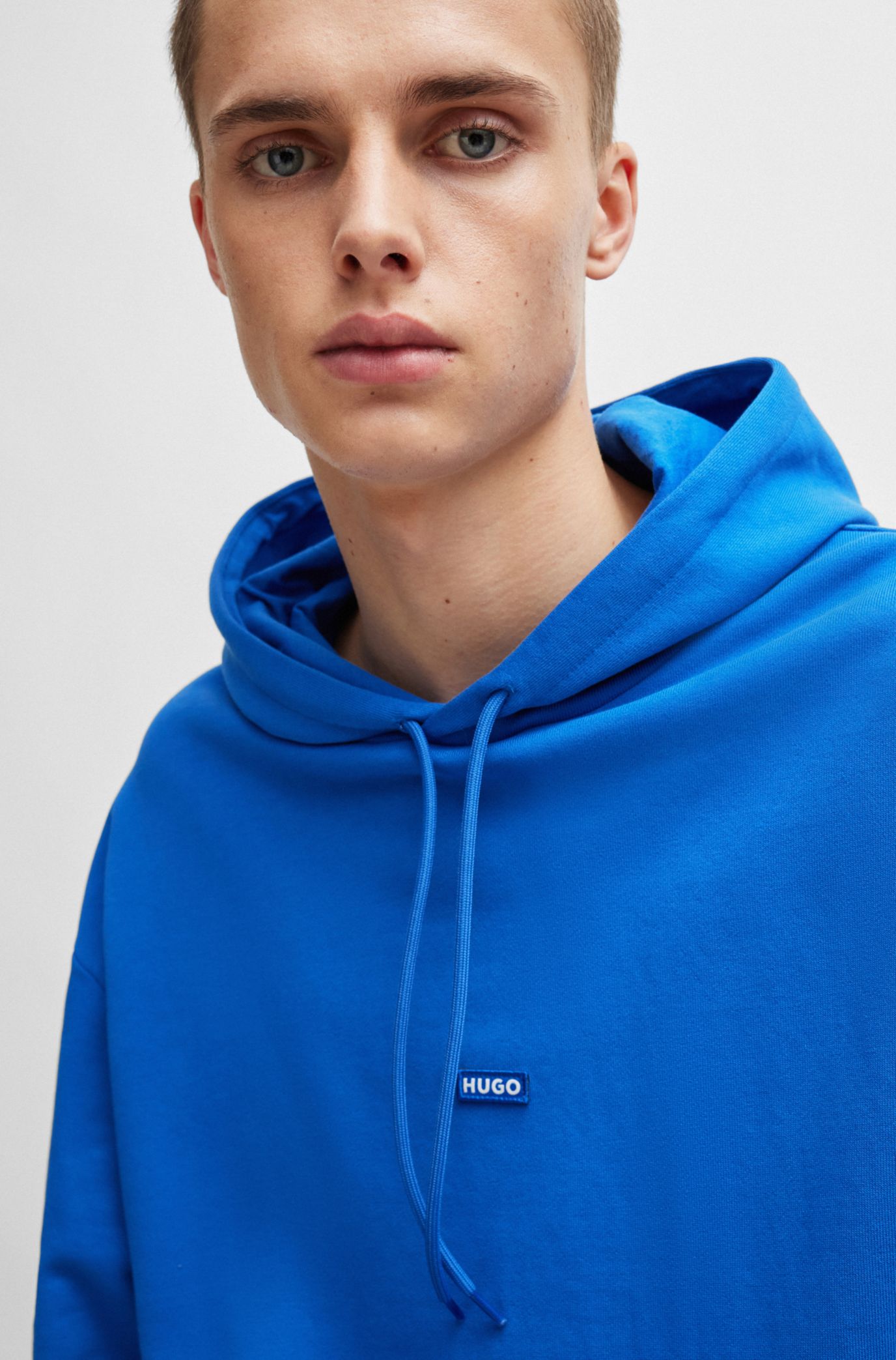 HUGO - Cotton-terry sweatshirt with blue logo label