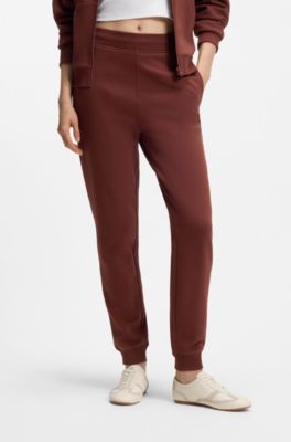 Pantalones de ch&aacute;ndal de felpa de algod&oacute;n con logo bordado, Marr&oacute;n