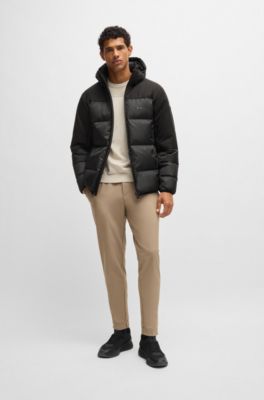 Chaqueta de plum&oacute;n repelente al agua con capucha extra&iacute;ble, Negro