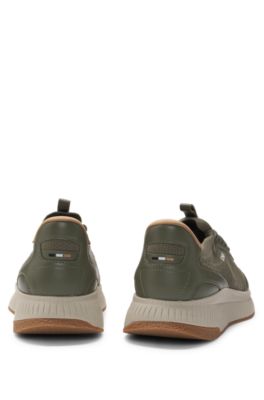 Mixed-material trainers with fishbone sole and signature accents, Dark Green
