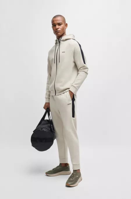 Mixed-material trainers with fishbone sole and signature accents