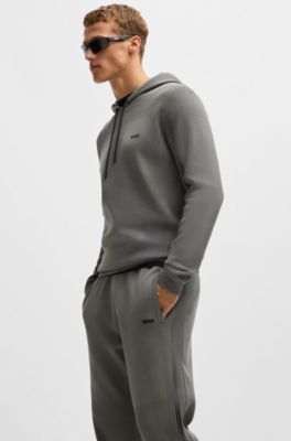 Regular-fit knitted tracksuit bottoms with stripes and branding