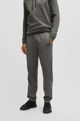 BOSS - Regular-fit knitted tracksuit bottoms with stripes