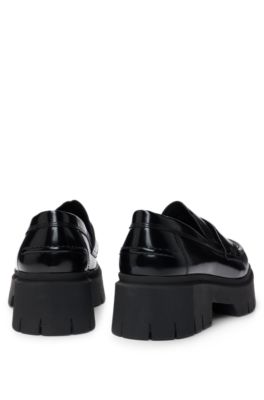 Mocasines de piel con suela gruesa y logo apilado, Negro