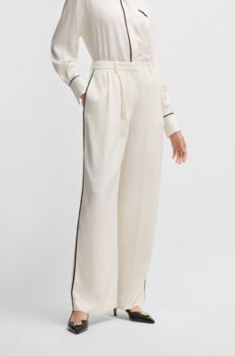 Pantalones relaxed fit con pernera ancha, Blanco