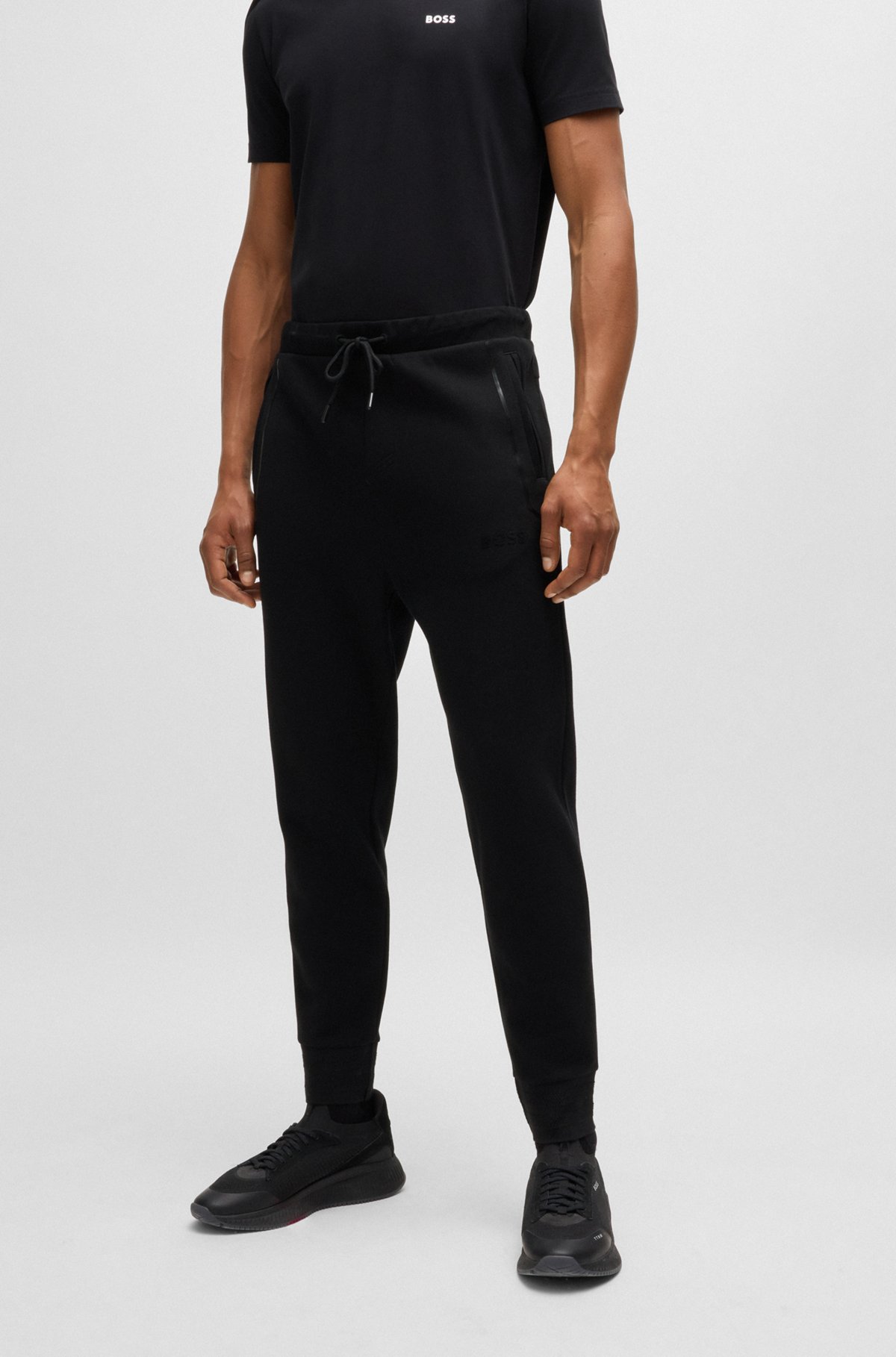BOSS - Tracksuit bottoms with mirror-effect logo - Black BOSS - Tracksuit bottoms with mirror-effect logo - Black