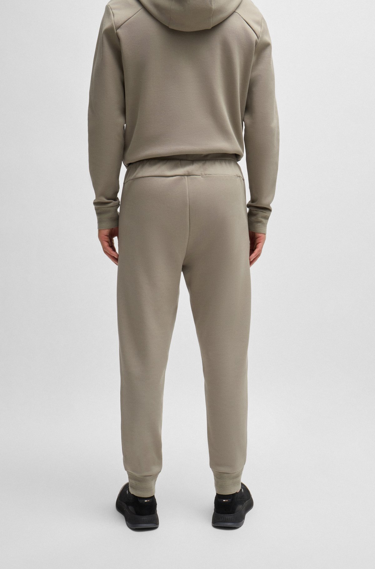 BOSS - Tracksuit bottoms with mirror-effect logo - Light Green BOSS - Tracksuit bottoms with mirror-effect logo - Light Green