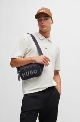 Ri&ntilde;onera con logo en contraste y capa exterior de malla, Negro