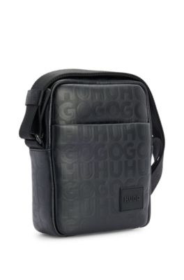 Reporter bag in faux leather with repeat-logo motif, Black