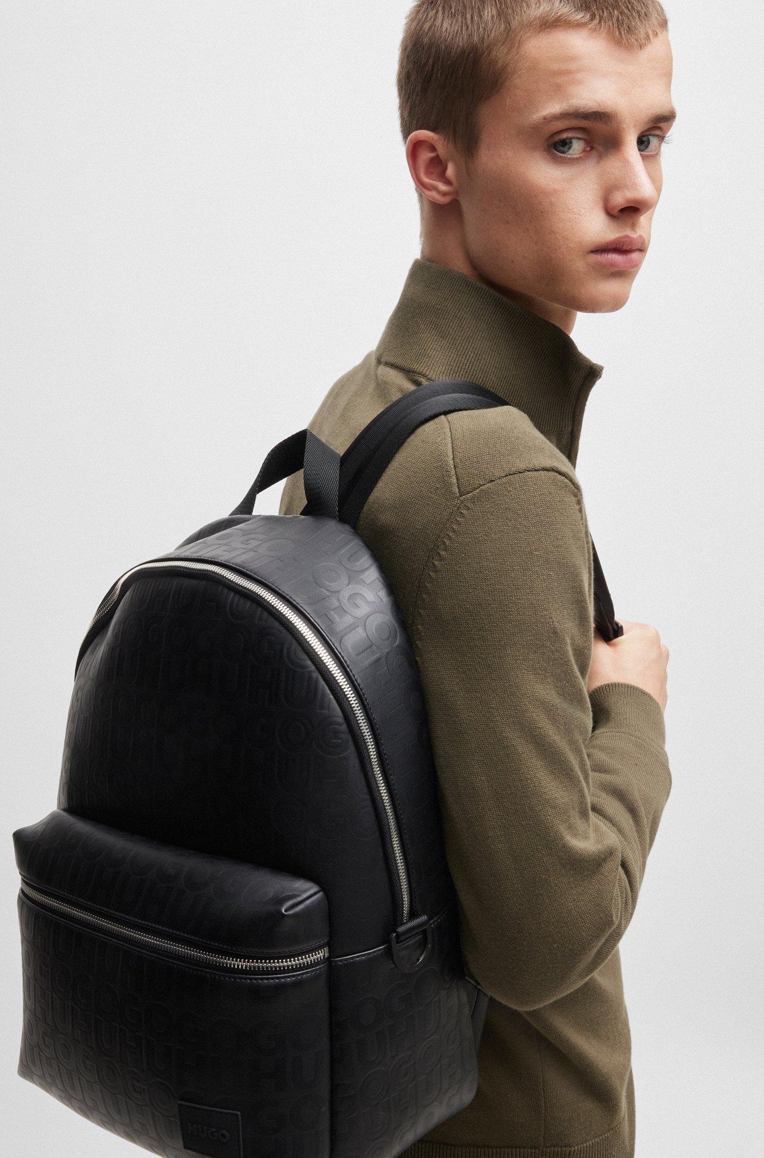 Faux-leather backpack with repeat-logo motif
