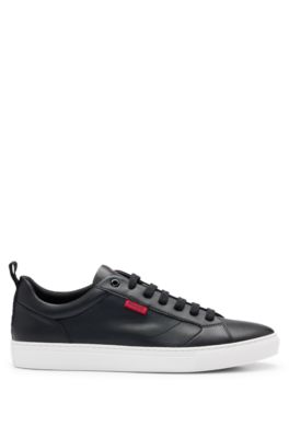 Cupsole trainers in faux leather with logo flag, Black
