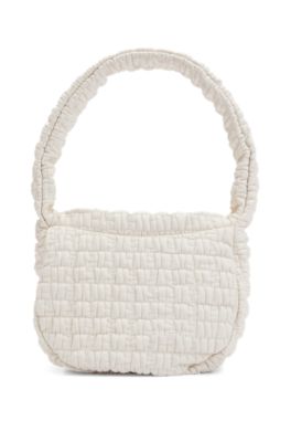 Shoulder bag in quilted-effect faux leather, White