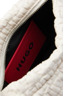 Shoulder bag in quilted-effect faux leather, White