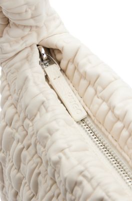 Shoulder bag in quilted-effect faux leather, White