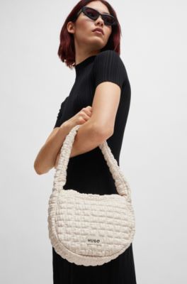 Shoulder bag in quilted-effect faux leather, White